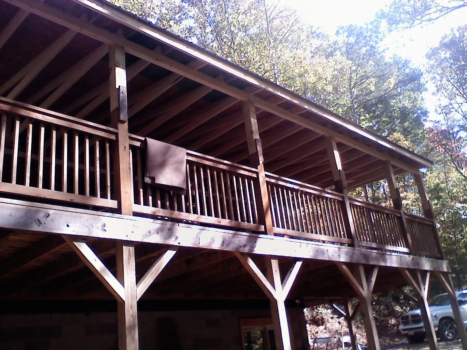 Timber framing under a new elevated porch and deck — Roof Leak Repair in Senoia by Roofing Brothers